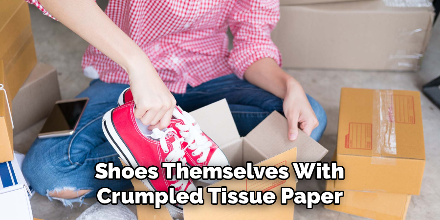 Shoes Themselves With
Crumpled Tissue Paper
